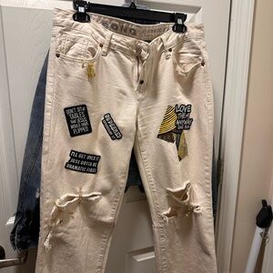 Beige Ripped Jeans with Patches